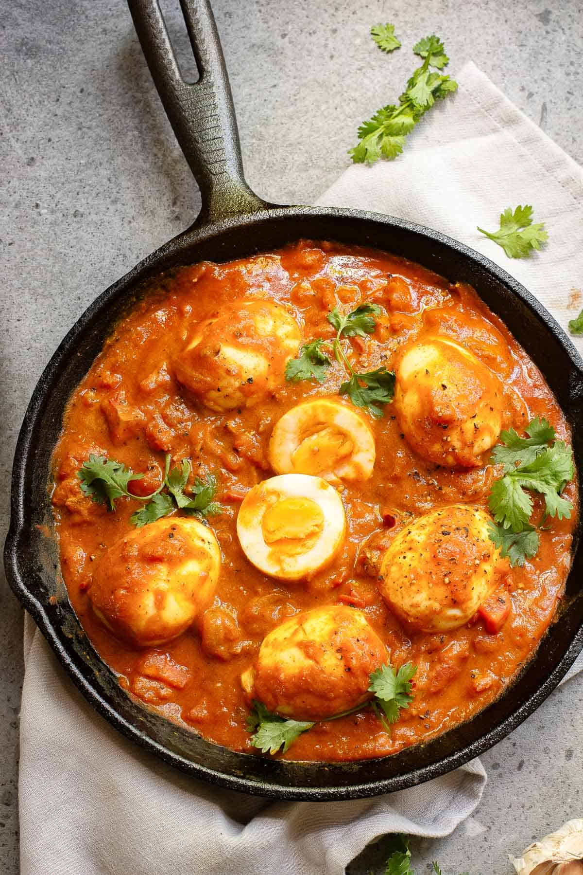 Boiled eggs in spicy tomato-based curry gravy