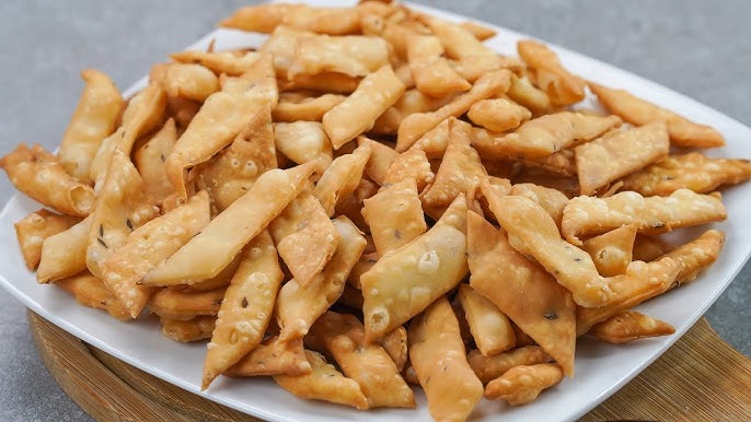 Crispy namak paray savory snack pieces fried until golden