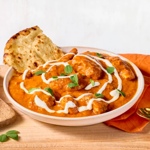 Creamy butter chicken curry with rich tomato gravy and tender chicken pieces