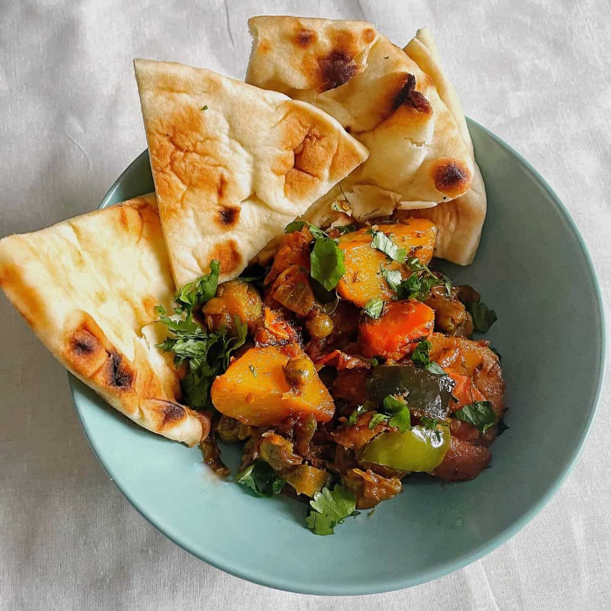 Mixed vegetable curry with carrots, beans, peas, and spices