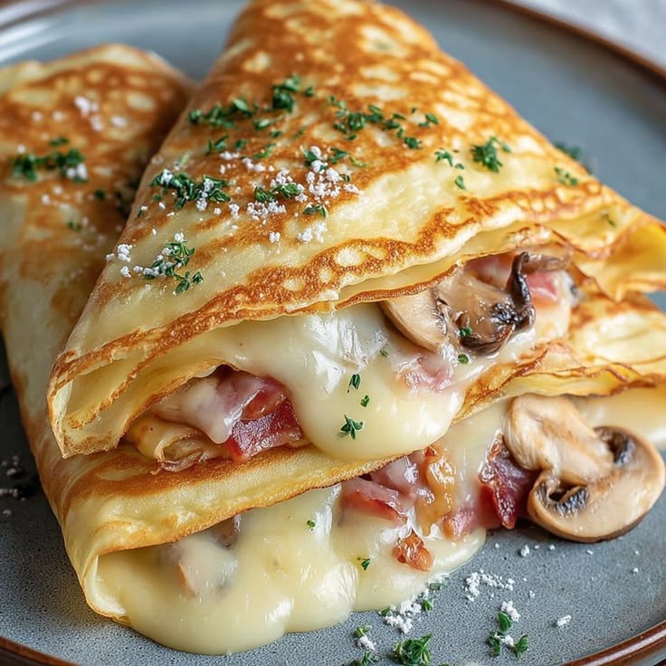 Thin French crepes folded with sweet filling.