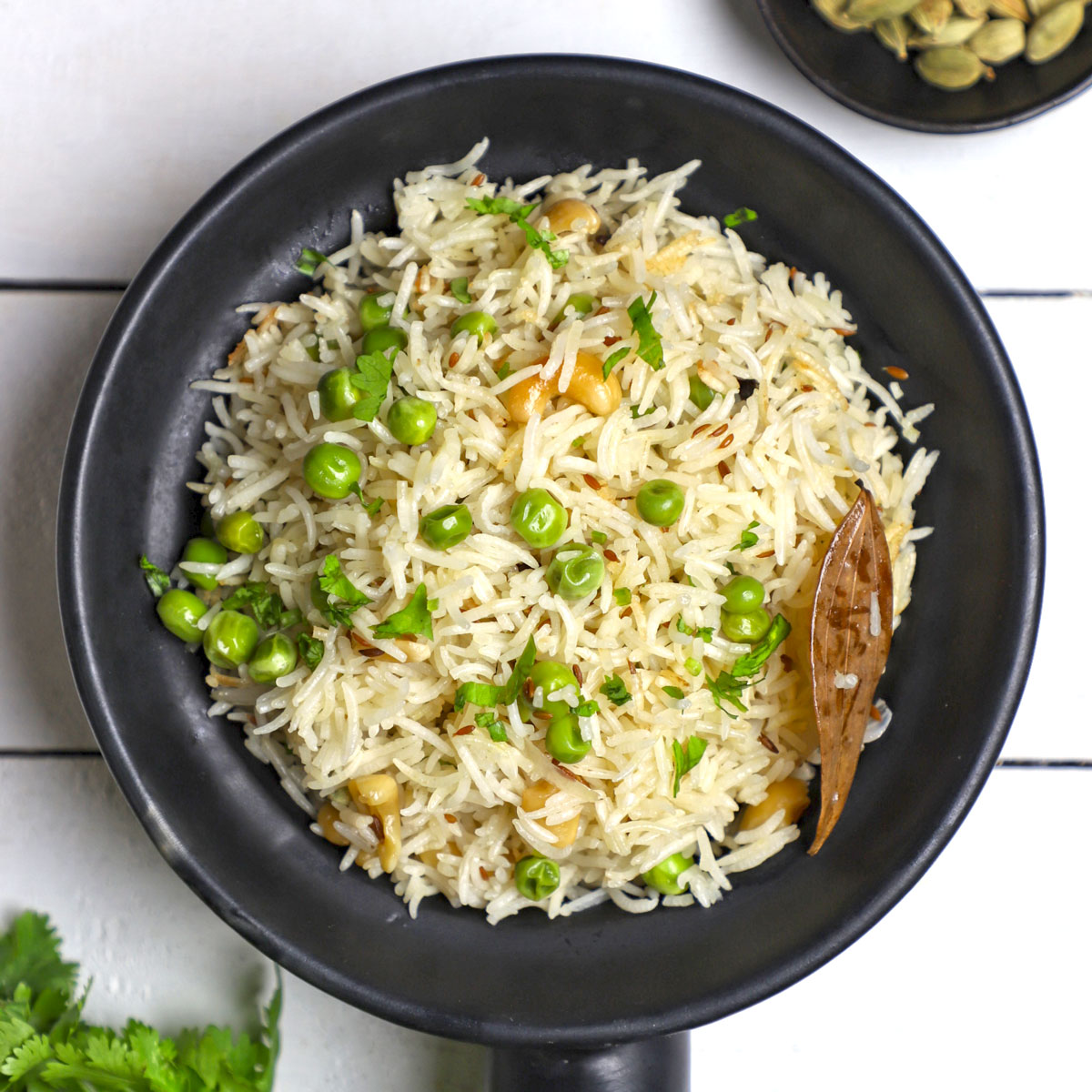 Fragrant basmati rice cooked with green peas and whole spices