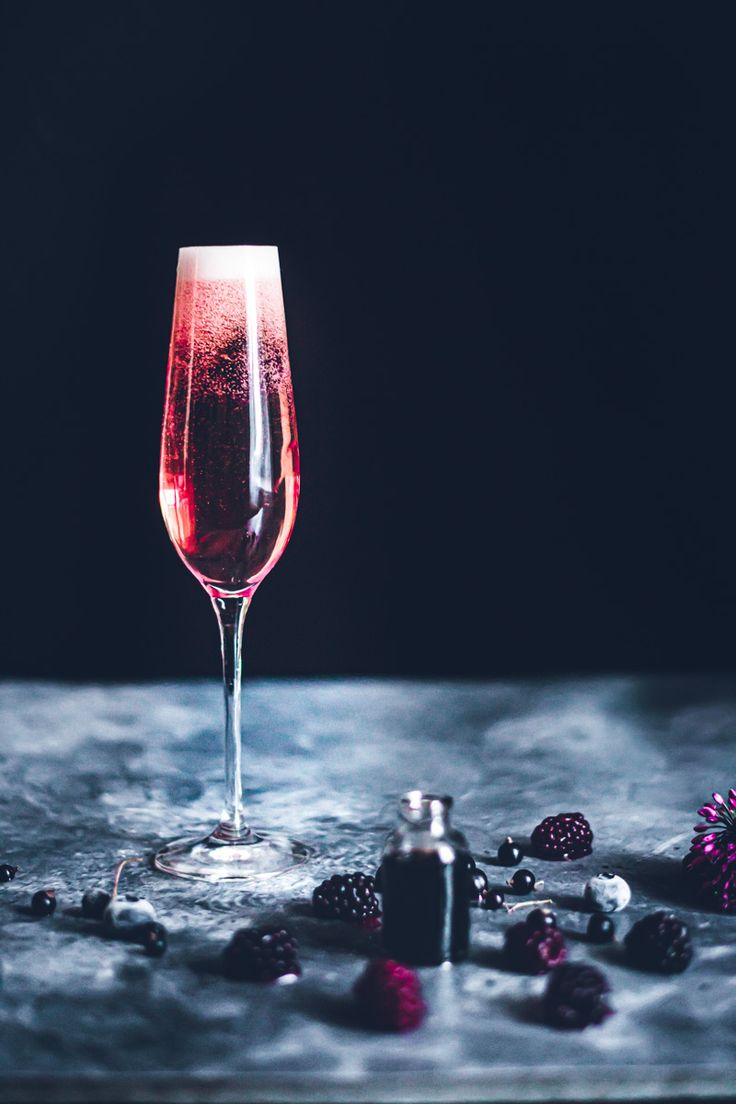 Kir Royale cocktail served in a champagne flute.