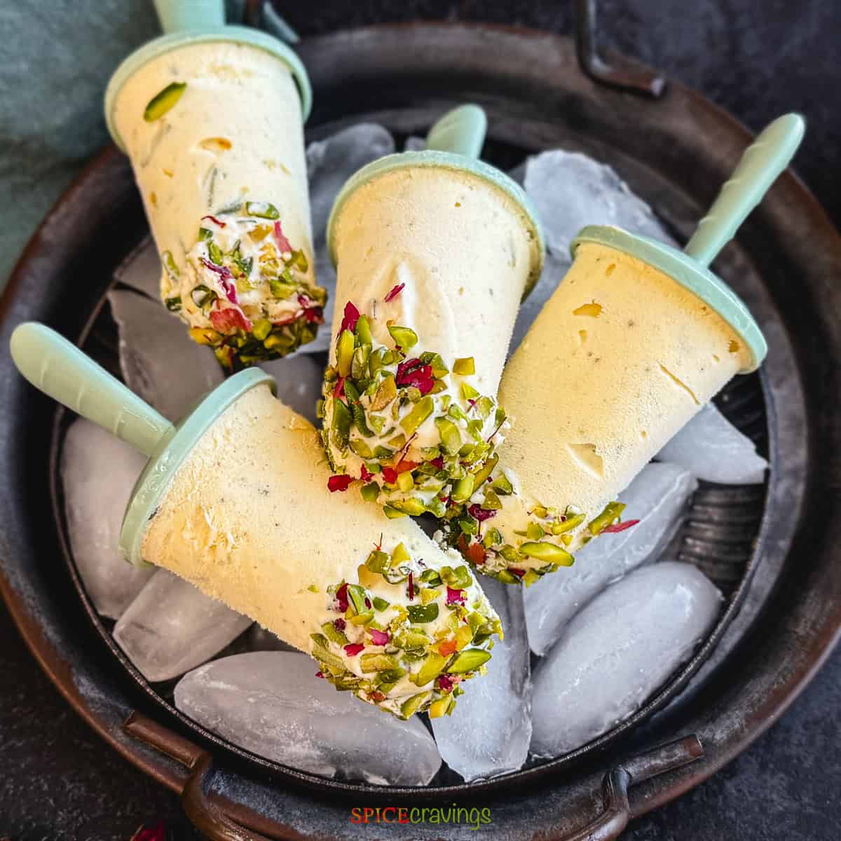 Traditional kulfi ice cream garnished with pistachios