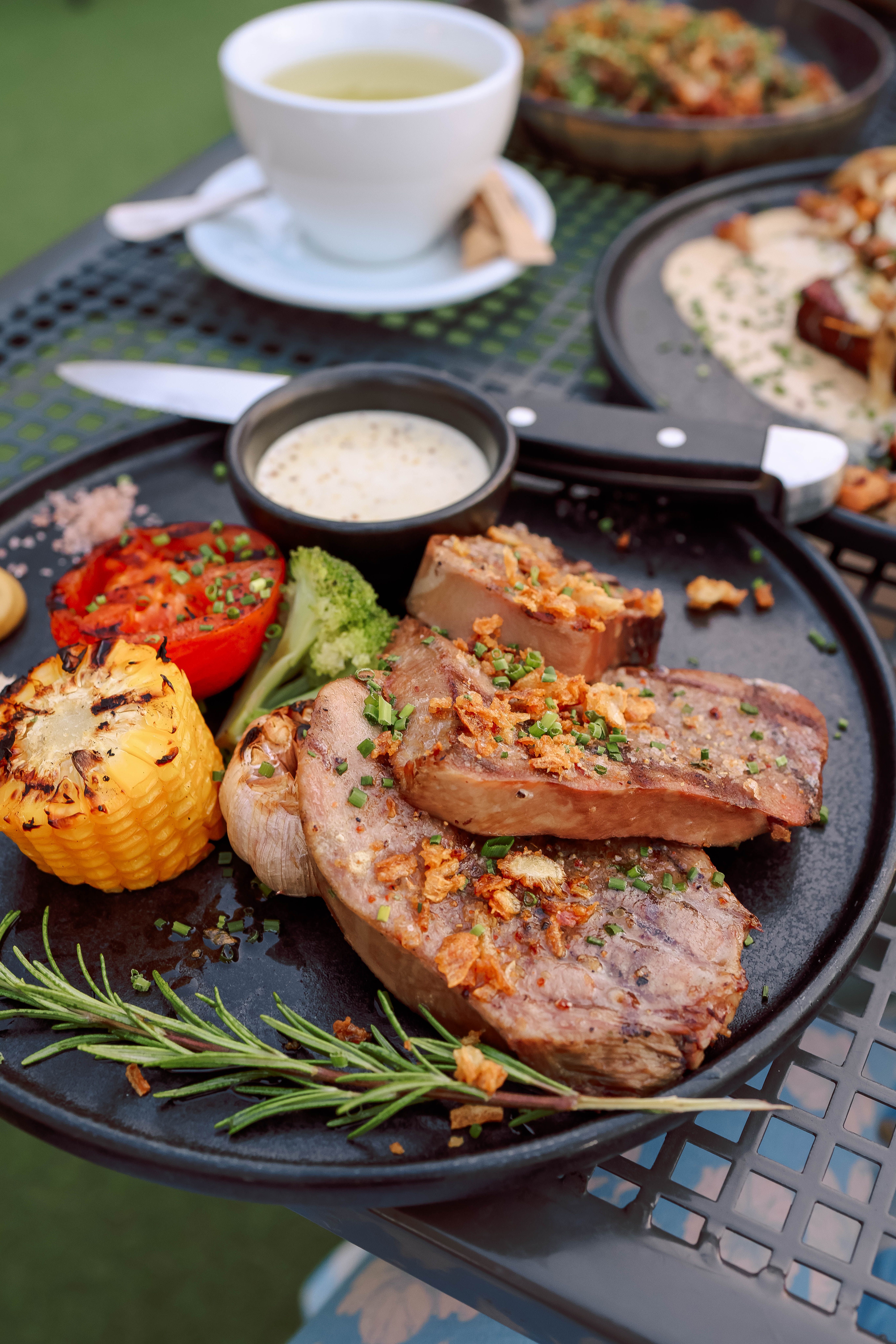 Tender cube steaks covered with rich onion and mushroom brown gravy in a large skillet.