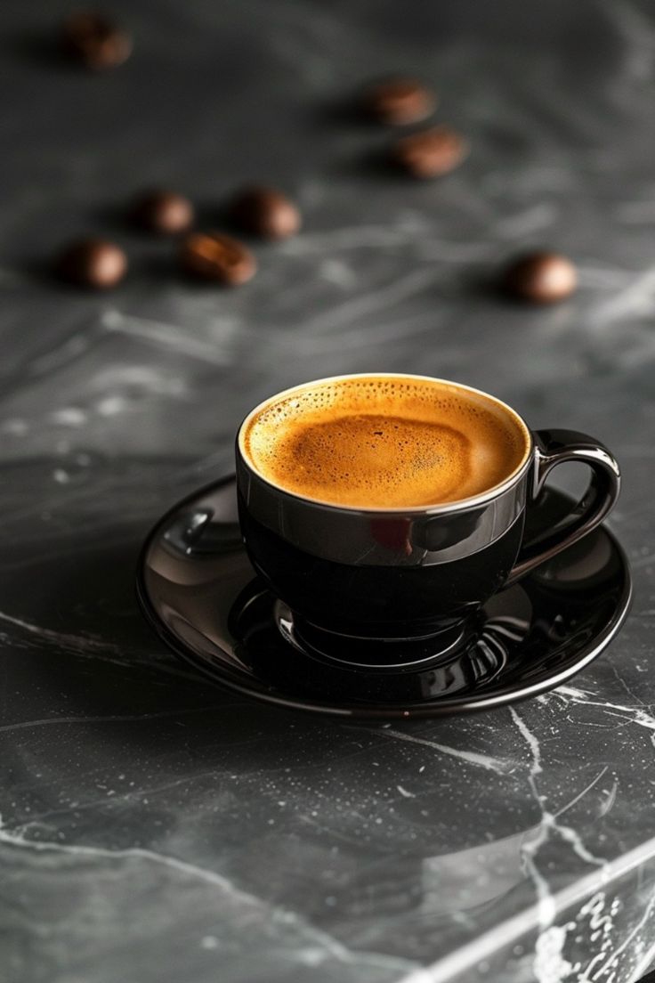 Freshly brewed espresso served in a small French coffee cup.