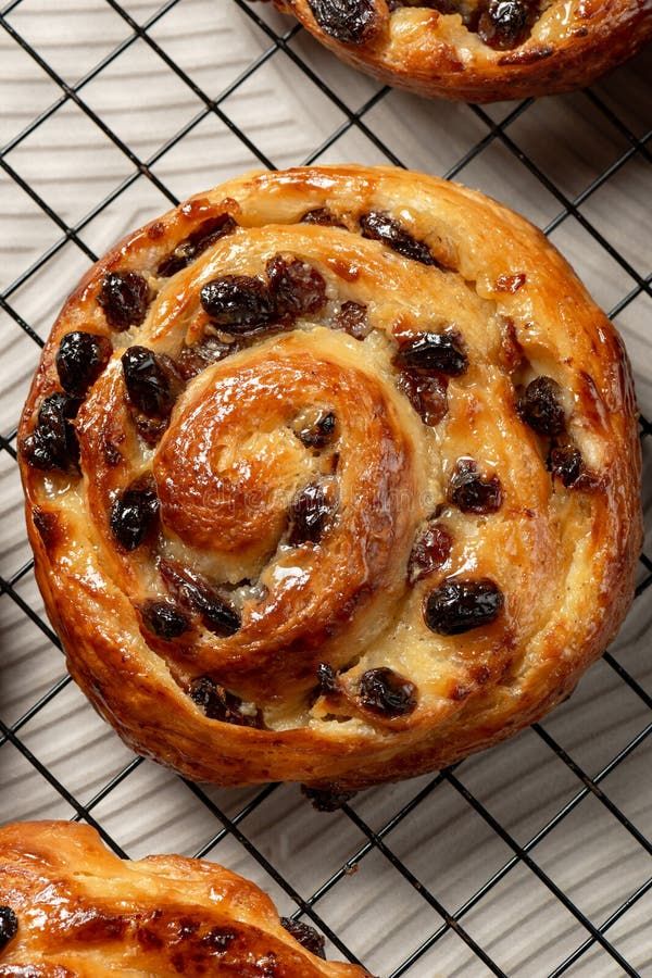 French Pain aux Raisins pastries with vanilla cream and raisins.