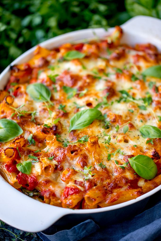 Creamy brie linguine pasta with cherry tomatoes and basil.