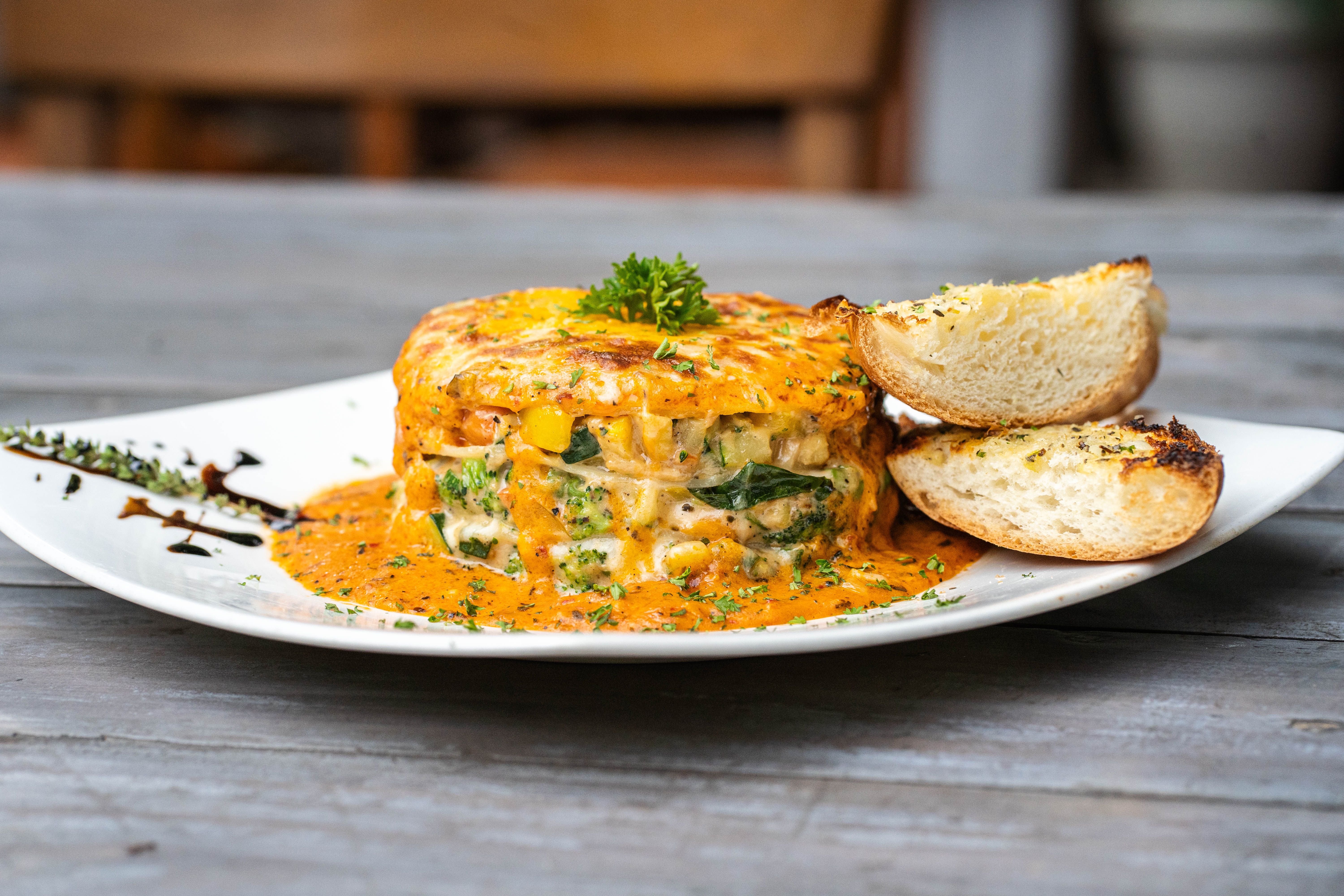 Delicious gourmet vegetable lasagna topped with cheese