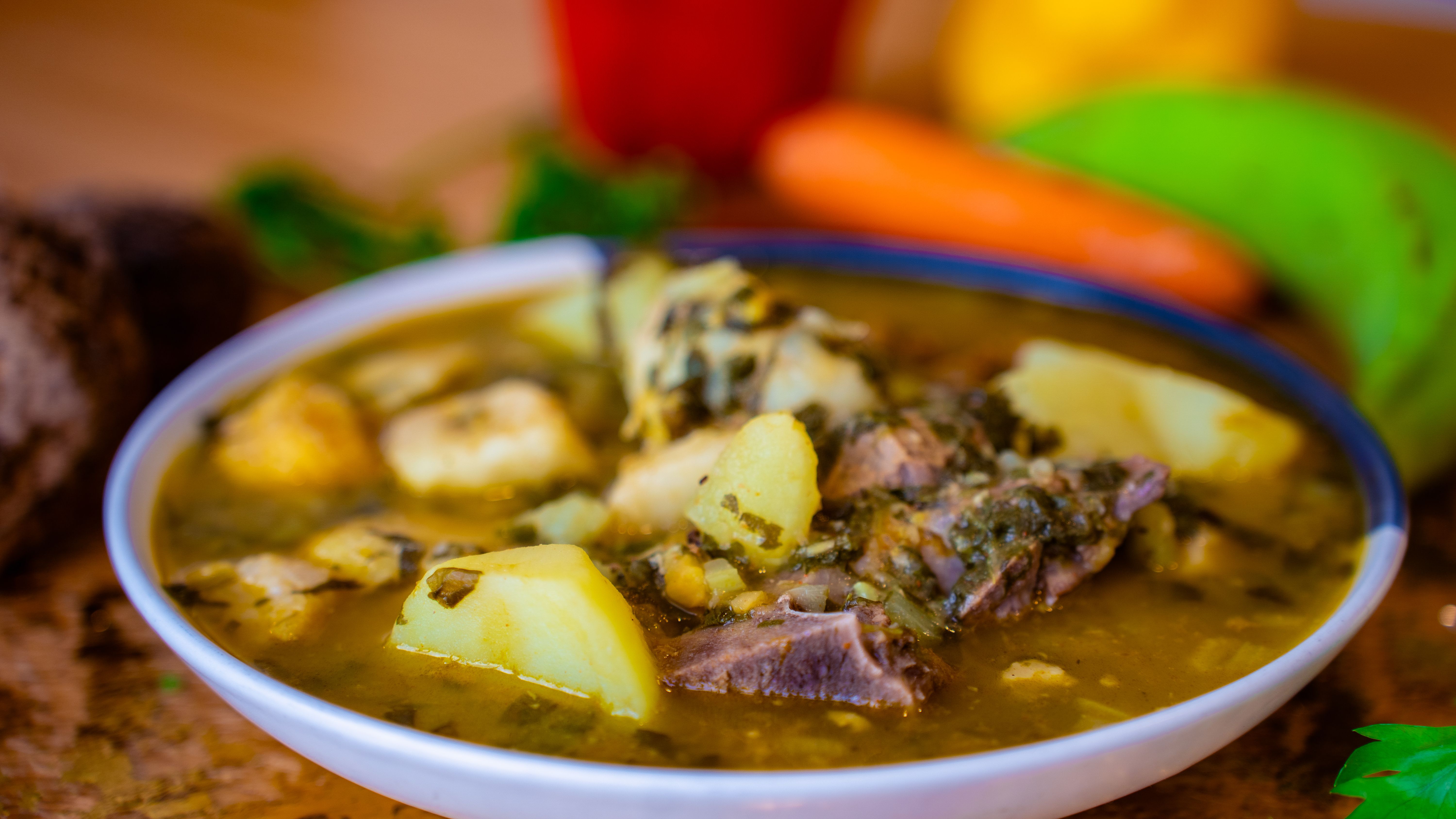 Traditional beef stew with tender beef chuck, potatoes, carrots and peas in a rich brown gravy.